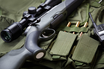 Hunting rifle and equipment.