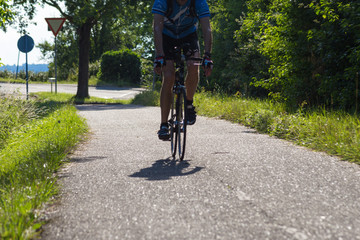 cyclists exercising on a bikeway © rudolfgeiger