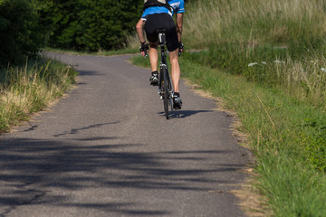 cyclists exercising on a bikeway © rudolfgeiger