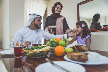 Obraz na płótnie Canvas Arabic happy family lifestyle moments at home
