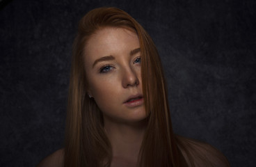 Fototapeta premium Studio portraits with red hair girl