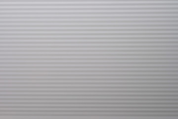 Gray striped background.