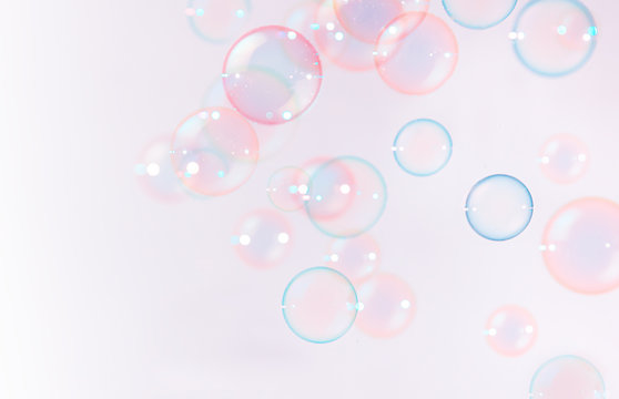 Abstract, Beautiful pink soap bubbles floating background.