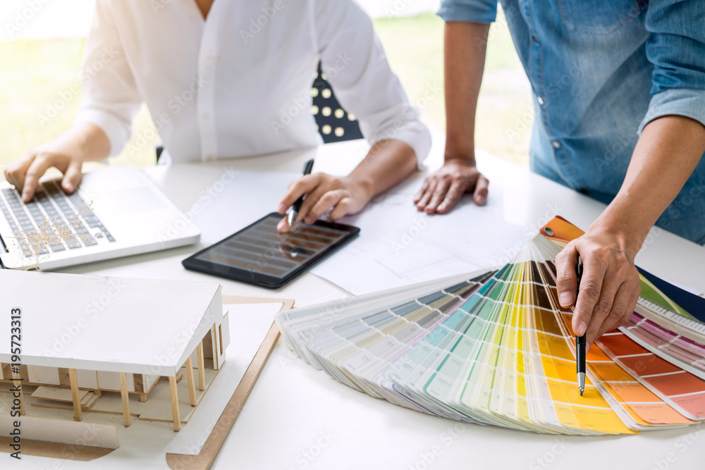 Poster two young women interior design or graphic designer working on project of architecture drawing with 