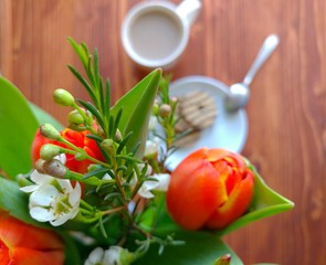 Coffee time. Tulips bouquet.