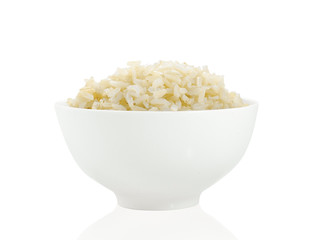 brown rice isolated with bowl on white background