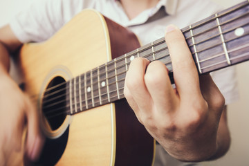 Fototapeta na wymiar Playing Acoustic guitar