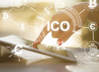 Hand using tablet with hologram