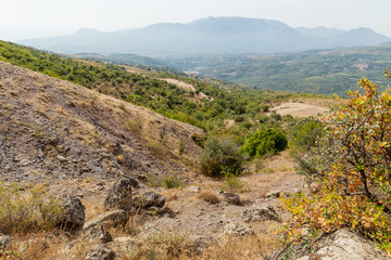 Panorama view from famous Ghost Valley with strangly shaped rocks. Demerdji mountains. Crimea, Russia.