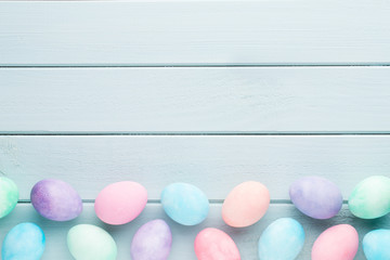 Pastel Easter eggs background. Spring greating card.