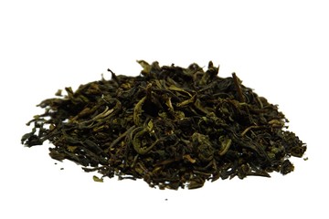 Tea leaves on white background. Focus on the front, obviously the background blurred.
