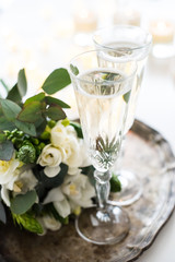 Beautiful vintage wedding decoration with champagne and white fl