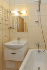 Small beige bathroom
