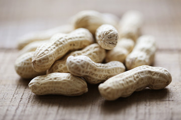 Peanuts on wooden table