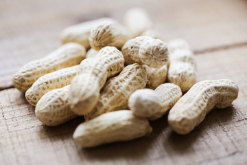 Peanuts on wooden table