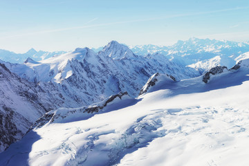 Fototapeta na wymiar Mountain peaks and Aletsch glacier winter Swiss Alps