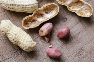 Peanuts on wooden table