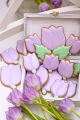 Purple homemade gingerbread cookies in the shape of tulips