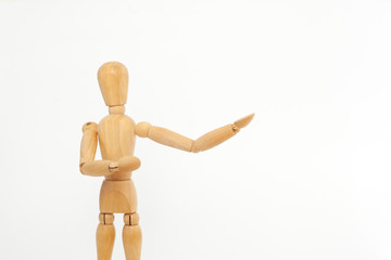 A wooden dummy shows to the right. On a white background.