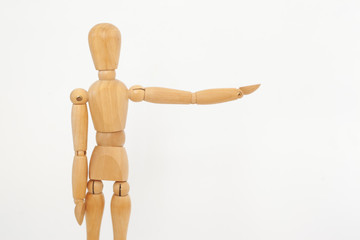 A wooden dummy shows to the right. On a white background.