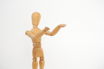A wooden dummy shows to the right. On a white background.