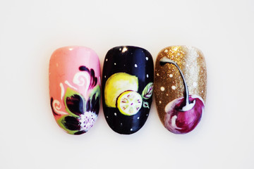 three plastic tips for nail extension and training in applying design while training a manicure on...