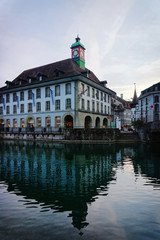 Fototapeta premium Building with Clock tower in Embankment Thun Old City Switzerland