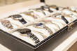 Collection of ladies wrist watches in storage box