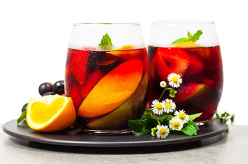 Summer Red Wine Sangria Drink Isolated on White Background. Selective focus.