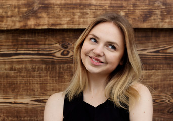 portrait of a girl on a wooden background