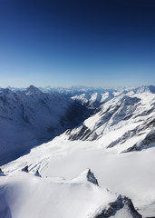 Fototapeta na wymiar Mountain peaks and Aletsch glacier winter Swiss Alps Switzerland