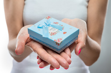 lovely little gift box in the beautiful manicured hands girls