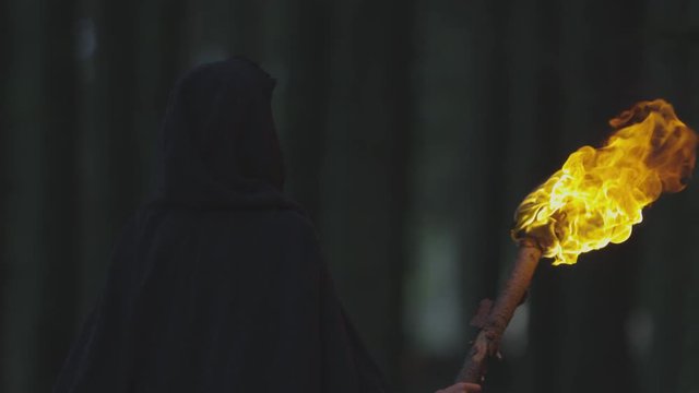 Woman with fire torch 