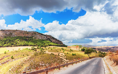 Road to Doric temple and landscape of Segesta Sicily