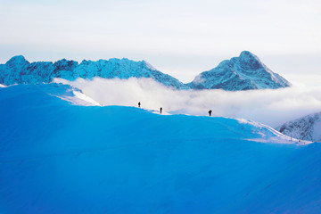 Fototapeta na wymiar People top in Kasprowy Wierch in Zakopane in Tatras winter