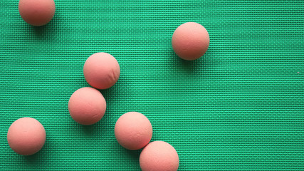 Small Pink Balls On Green Mat At Kid Playground