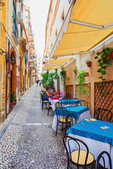 Obraz premium Street restaurant at Cefalu old town Sicily