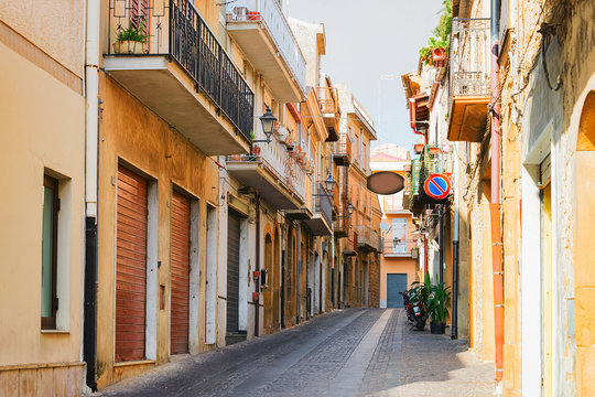 Street with old houses in Aidone Sicily