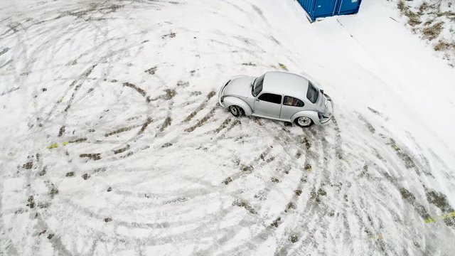 Car making a drift in the snow