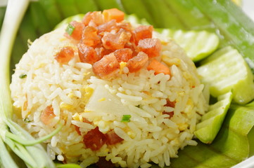 fried rice with chop Chinese sausage on banana leaf