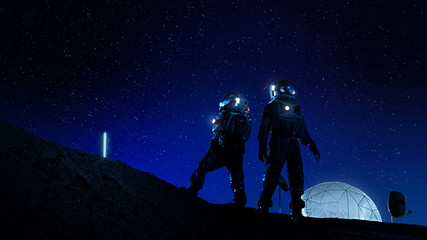 Two Astronauts in Space Suits Stand on the Moon Looking at the Beautiful Nght Sky Full of Stars. In the Background Lunar Base with Geodesic Dome. Moon Colonization and Space Travel Concept.