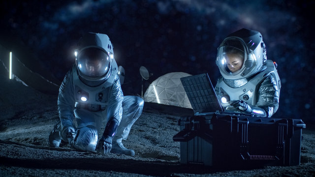 Two Astronauts Collect Rock and Soil Samples on the Alien Planet. Space Travel and Exploration, Finding Habitable Planet, Colonization Concept.