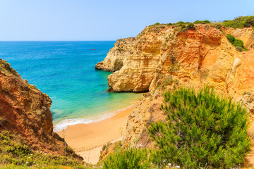 Fototapeta premium View of beautiful beach with rocks near Portimao town, Algarve, Portugal