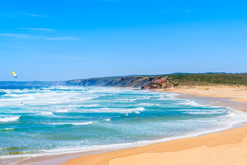 View of beautiful Praia da Bordeira beach, popular place to do kite surfing, Algarve, Portugal