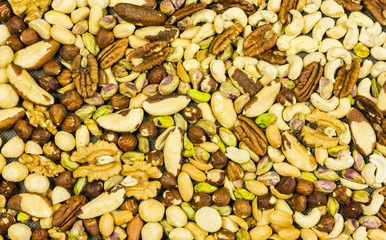 A mixture of nuts as a background, texture or pattern.