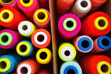 Fototapeta premium multi-colored coil threads, sewing threads