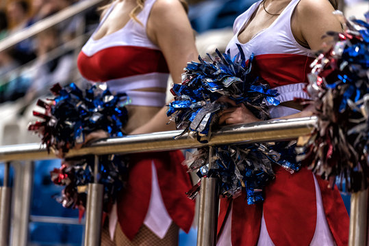 Pom Pom cheerleaders in the hands of a sports match