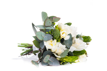 bridal bouquet of flowers, white freesias and orchids on a white