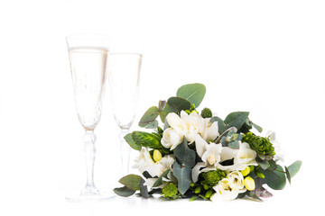 bridal bouquet of flowers and champagne, white freesias and orch