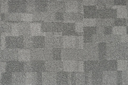 Texture carpet covering, gray with a pattern of squares